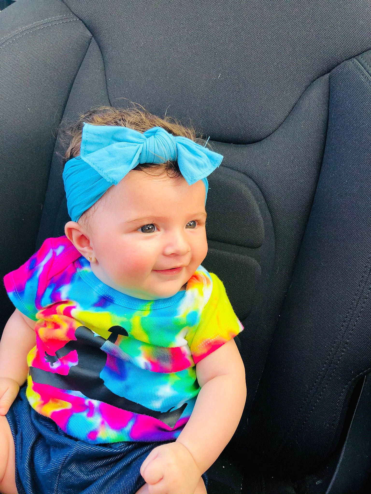 Kehlani joined the competition — help win amazing prizes! azure, baby, baby_toddler_clothing, cap, child, dress, electric_blue, fashion_accessory, fun, grass, happy, hat, headwear, magenta, pattern, person, purple, sitting, sleeve, smile