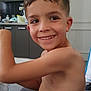 Milan Andrea a rejoint le concours — aidez-le/la à gagner de superbes lots ! child, boy, smiling, shirtless, water_bottle, kitchen, cabinet, door, short_hair, happy, indoor, furniture, person, young, casual, home, light, skin, face, arm