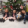 Valentina a rejoint le concours — aidez-le/la à gagner de superbes lots ! baby, car_seat, child, children, christmas_tree, cute, decorations, dress, family, festive, floor, happy, holiday, holiday_lights, indoors, pink_dress, portrait, sitting, smile, toy