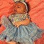 Luna is registered to the contest to win money with this photo: baby, infant, tutu, headband, blue, pink, floral, onesie, towel, soft, cute, newborn, foot, hand, clothing, laying, portrait, child, adorable, fabric