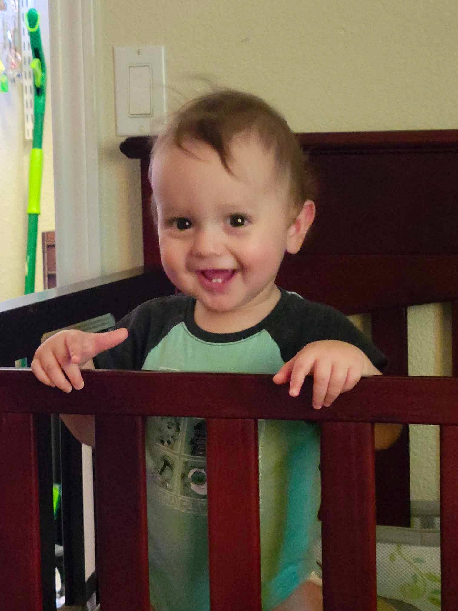 Grayson joined the competition — help win amazing prizes! baby, baby_safety, baby_toddler_clothing, cheek, child, door, eye, facial_expression, fun, happy, hardwood, joy, pattern, person, rectangle, room, sleeve, smile, standing, t_shirt