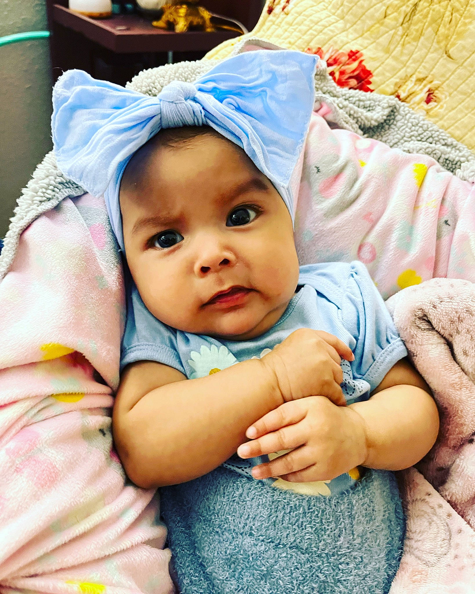 Nevaeh joined the competition — help win amazing prizes! baby, baby_products, baby_toddler_clothing, cheek, child, comfort, fashion_accessory, fun, happy, headwear, linens, person, pink, play, portrait_photography, purple, sitting, skin, sleeve, smile