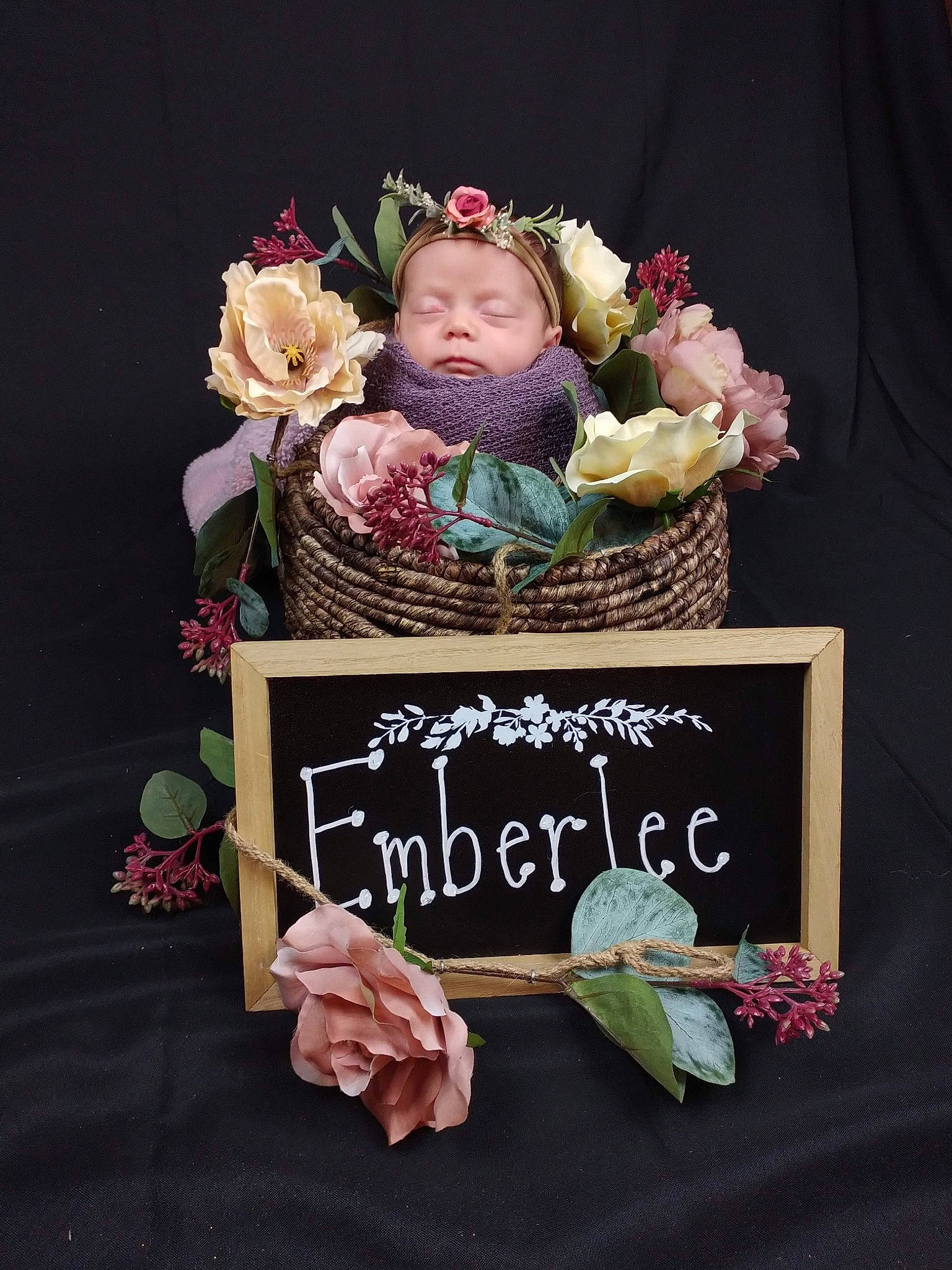 Emberlee is registered to the contest to win money with this photo: artificial_flower, baby, bouquet, cut_flowers, event, flower, flower_arranging, font, garden_roses, headpiece, hybrid_tea_rose, person, petal, picture_frame, pink, plant, rectangle, rose, rose_family, rose_order