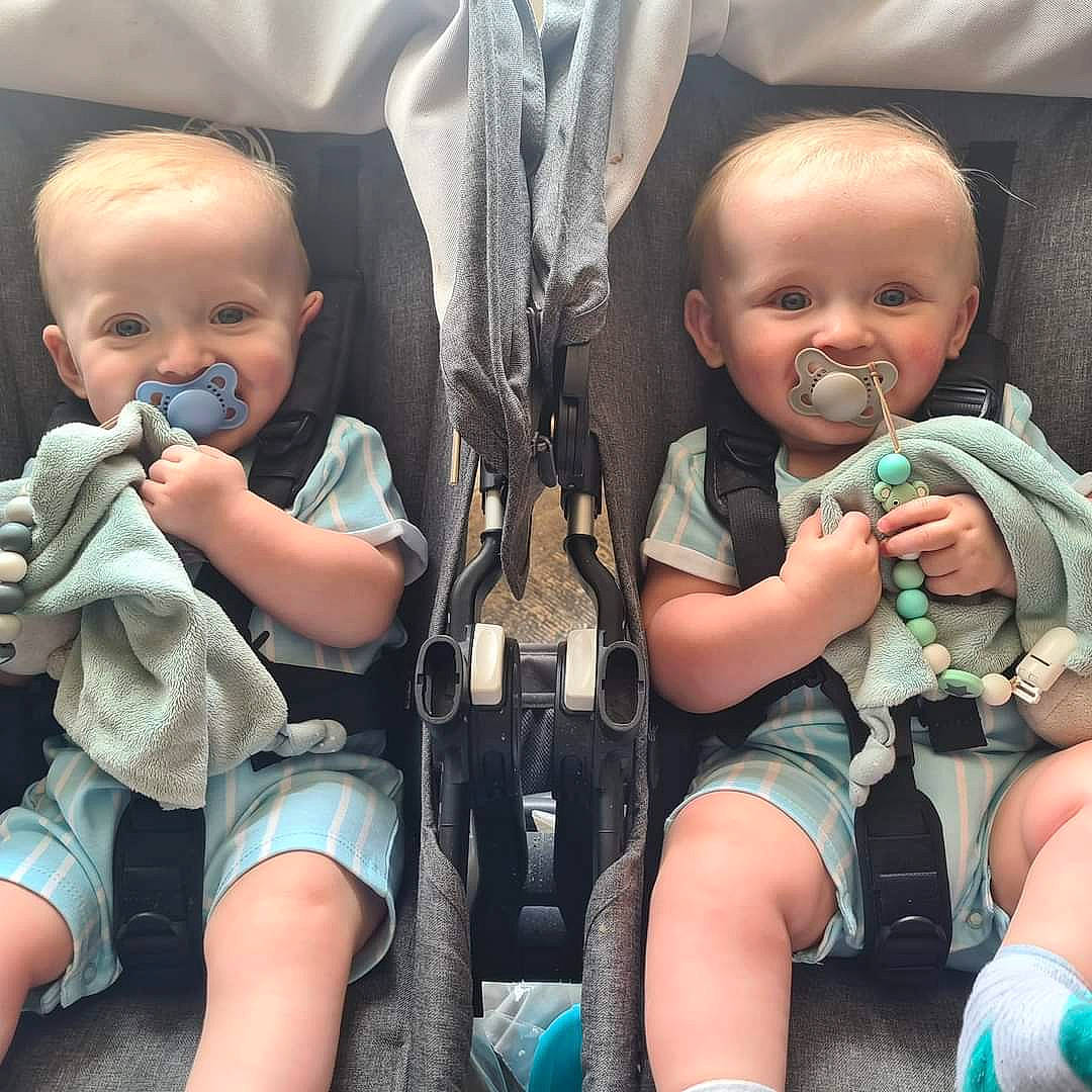 Corey And Caiden is registered to the contest to win money with this photo: arm, blue, comfort, eye, face, facial_expression, green, hand, happy, head, human, iris, joy, mammal, mouth, organ, person, photograph, product, shorts