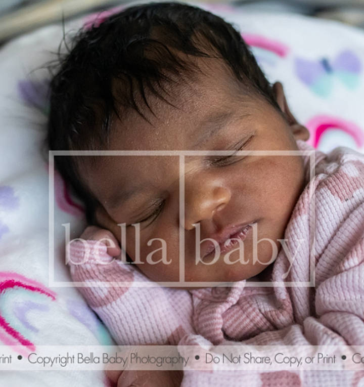 Artavia is registered to the contest to win money with this photo: baby, bedtime, cheek, child, comfort, ear, eyebrow, eyelash, font, forehead, gesture, happy, linens, mouth, nose, pattern, person, skin, sleeve, smile