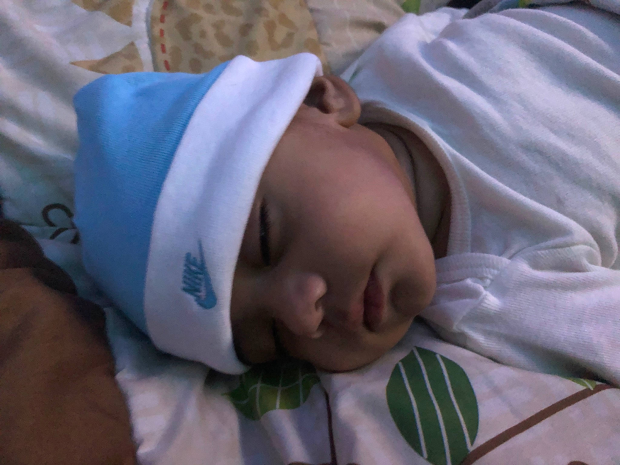 Aiden joined the competition — help win amazing prizes! baby, baby_products, baby_sleeping, baby_toddler_clothing, bedtime, cheek, child, comfort, eye, face, grass, head, headwear, linens, nap, pattern, person, room, skin, sleep