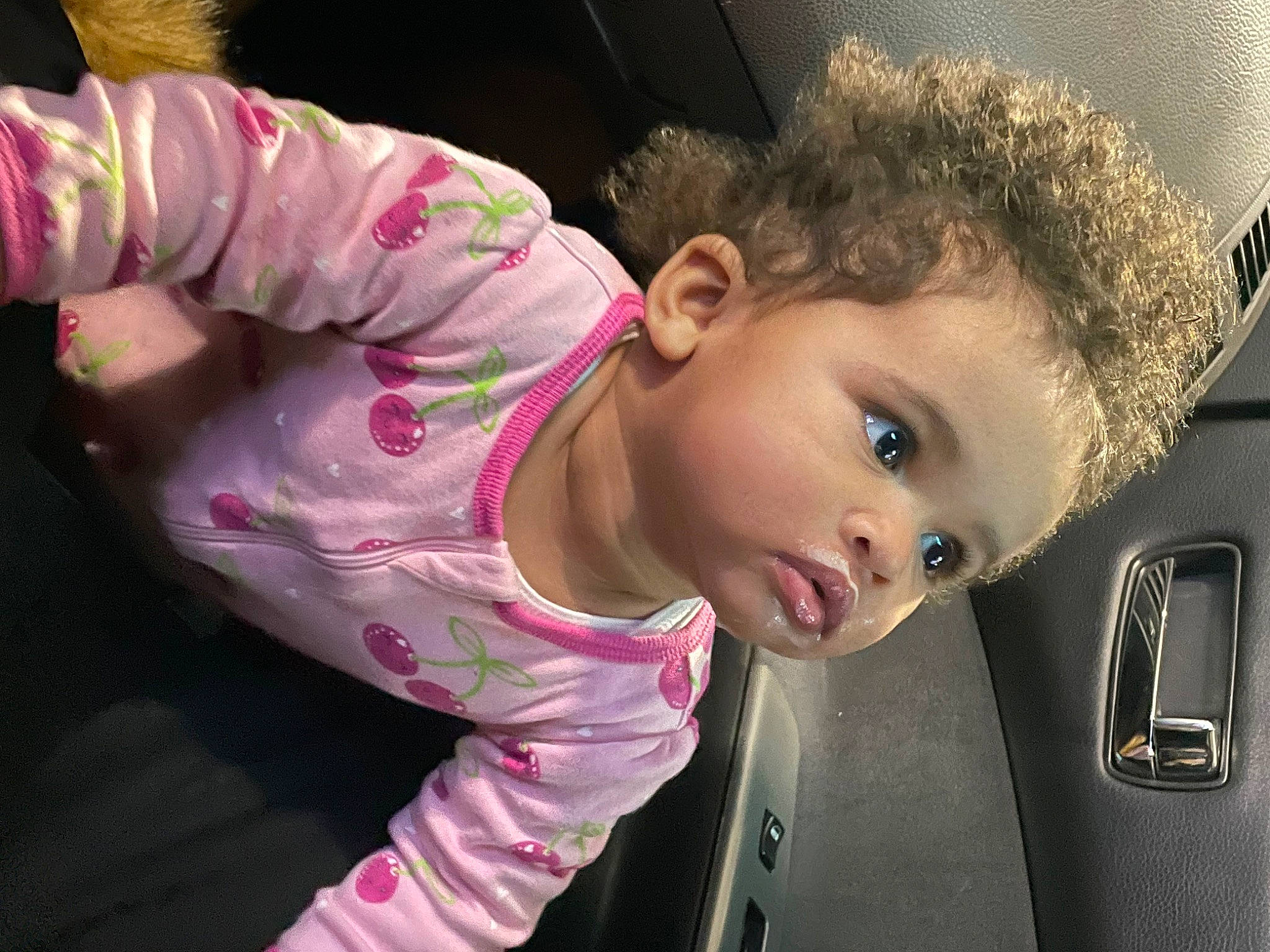 Akeelah joined the competition — help win amazing prizes! automotive_exterior, automotive_lighting, baby, car, cheek, child, face, family_car, finger, flash_photography, fun, happy, head, mouth, nose, person, personal_luxury_car, pink, skin, toddler