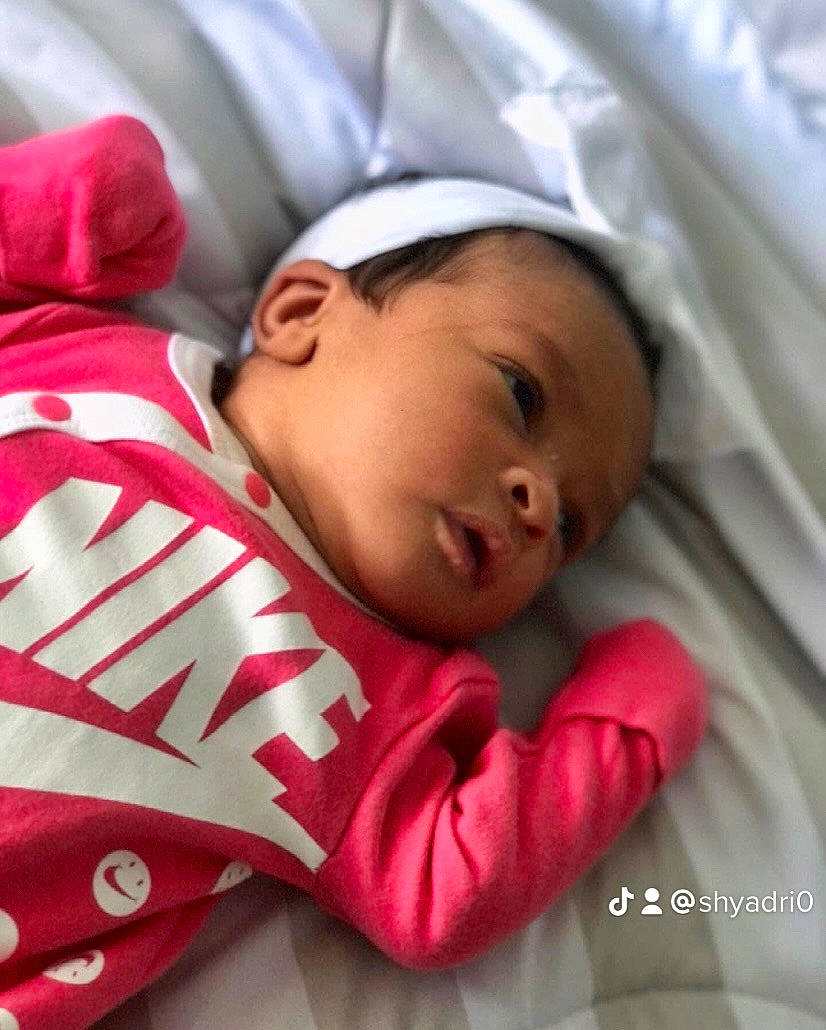 Akeelah is registered to the contest to win money with this photo: baby, baby_sleeping, baby_toddler_clothing, bedtime, cheek, comfort, eye, eyelash, hair, happy, linens, lip, mammal, mouth, nose, person, skin, sleeve, textile, toddler