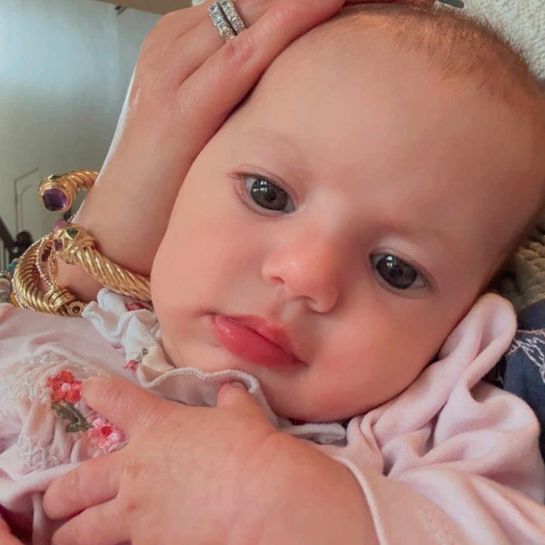 Medinah joined the competition — help win amazing prizes! baby, bracelets, child, closeup, cozy, cute, eyes, face, hand, indoor, infant, jewelry, newborn, person, pink_clothing, portrait, rings, skin, soft_lighting, tenderness