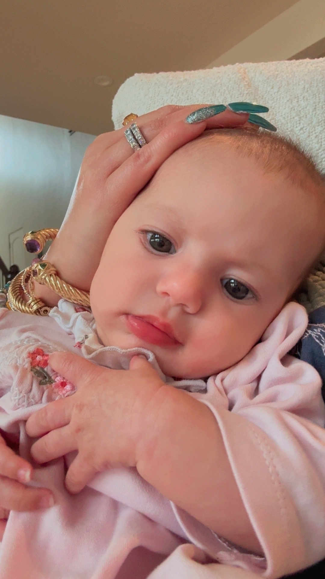 Medinah joined the competition — help win amazing prizes! baby, infant, closeup, hand, jewelry, rings, bracelets, pink_clothing, cute, face, skin, eyes, portrait, soft_lighting, cozy, newborn, child, person, indoor, tenderness