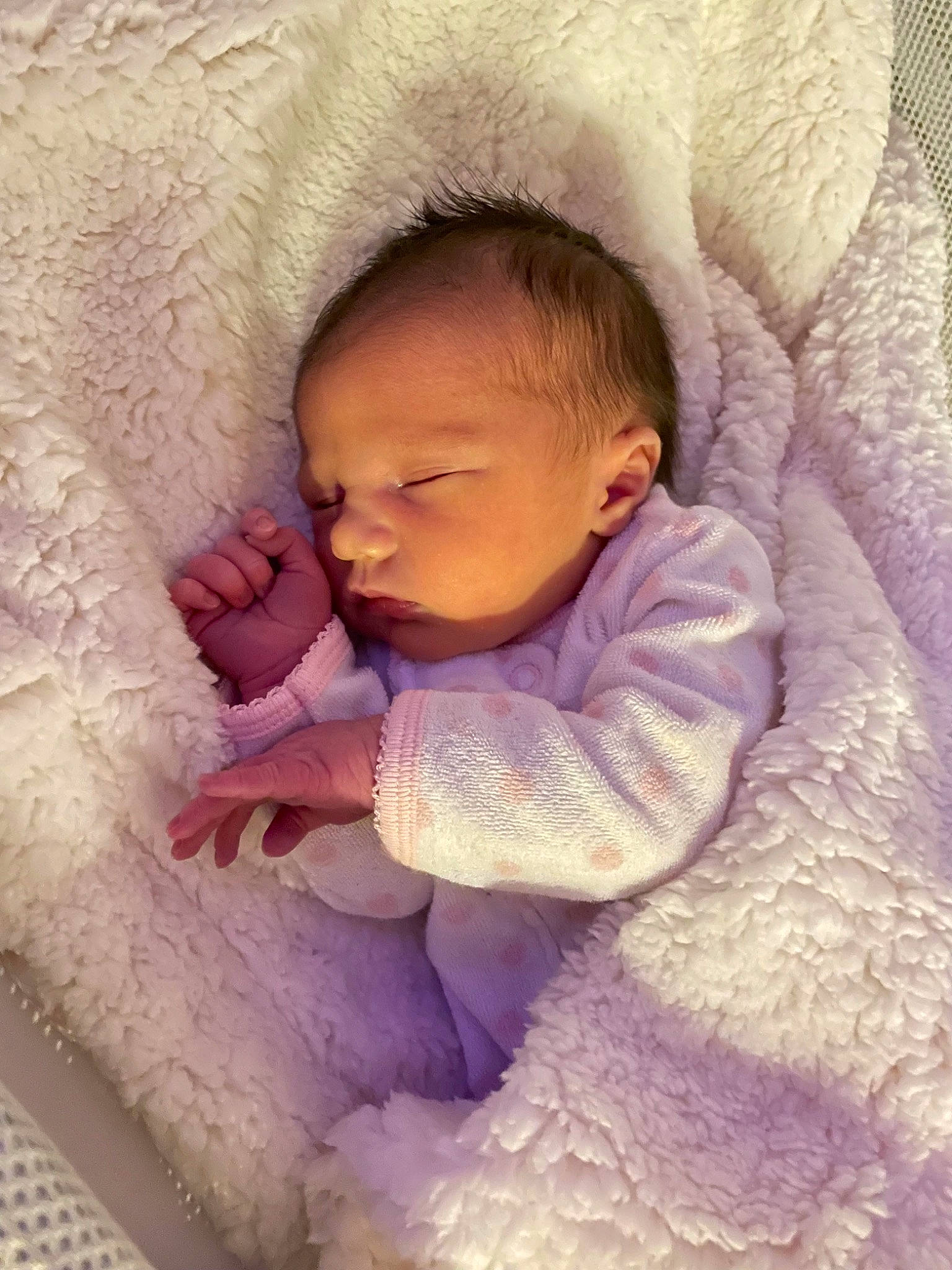 Kinsley is registered to the contest to win money with this photo: arm, baby, baby_sleeping, baby_toddler_clothing, cheek, comfort, eye, face, hand, head, human_body, iris, mammal, nose, person, pink, product, purple, skin, sleeve