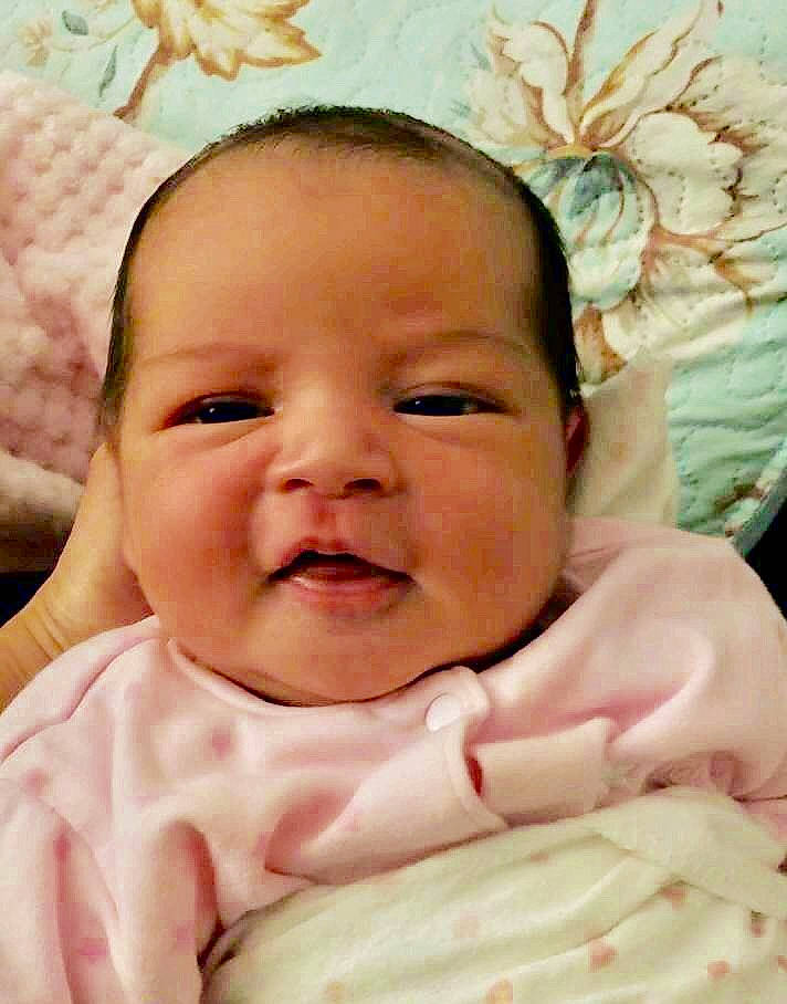 Juliette is registered to the contest to win money with this photo: baby, baby_making_funny_faces, cheek, child, face, facial_expression, head, lip, mouth, nose, person, pink, skin, smile, toddler