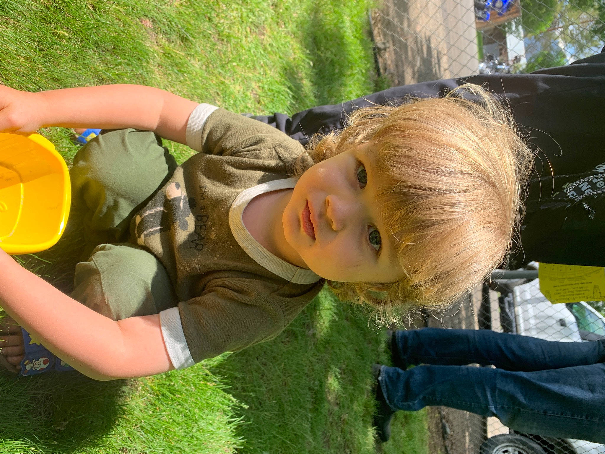 Dylan joined the competition — help win amazing prizes! balloon, child, fun, grass, grassland, happy, lawn, leisure, party_supply, people_in_nature, person, plant, play, recreation, sitting, toddler, tree, vacation, yellow