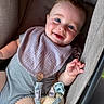 Walker is registered to the contest to win money with this photo: baby, child, infant, smiling, happy, portrait, stroller, bib, striped_clothing, blue_eyes, blond_hair, sitting, toy, pacifier, outdoor, close_up, face, hand, baby_clothing, adorable