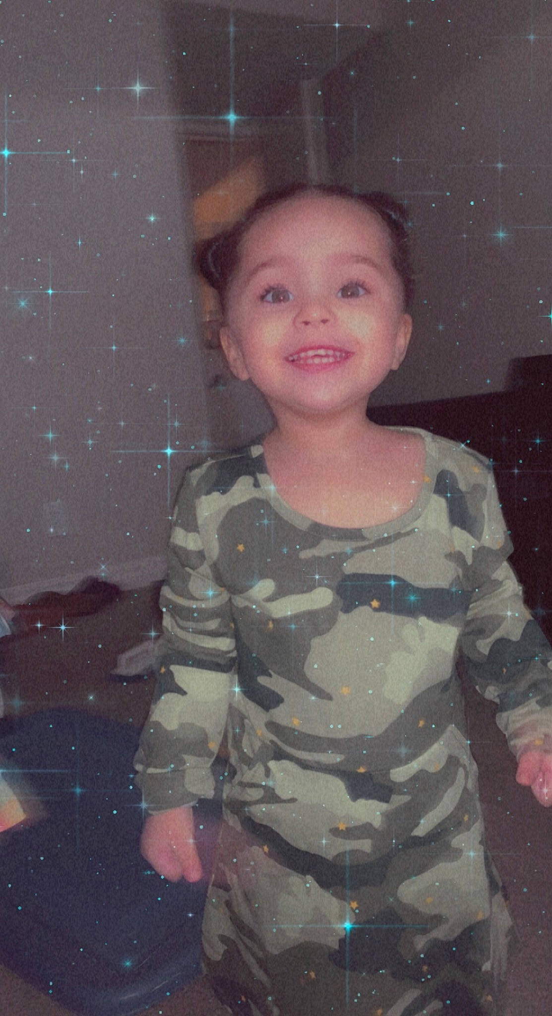 Celeste is registered to the contest to win money with this photo: camouflage, cheek, chin, cool, eyebrow, flash_photography, forehead, happy, human_body, iris, joy, military_camouflage, mouth, nose, person, skin, sleeve, smile, standing, tints_and_shades