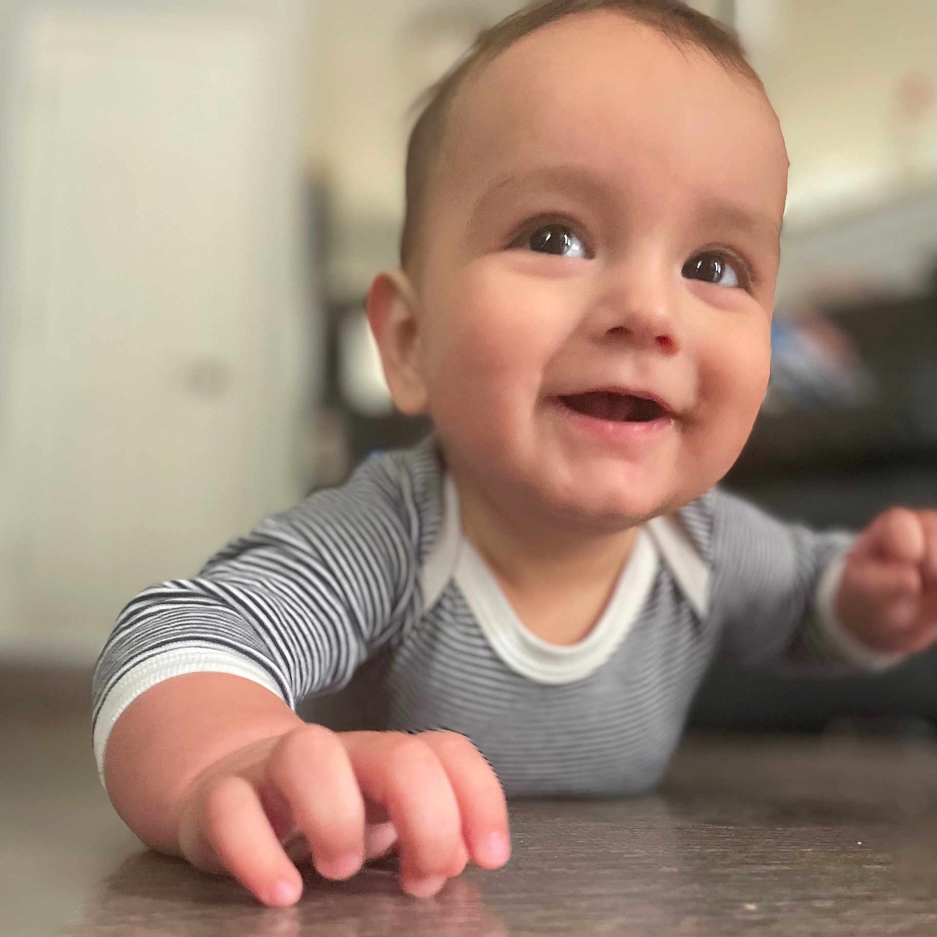 Kassius is registered to the contest to win money with this photo: baby, babylaughing, crawling, face, happy, head, person, smile