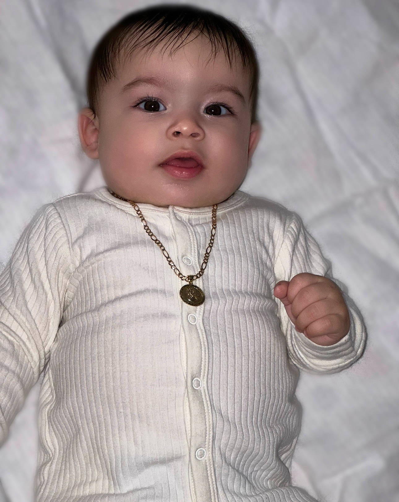 Greysen is registered to the contest to win money with this photo: baby, baby_toddler_clothing, cheek, clothing, collar, dress_shirt, face, gesture, grey, iris, lip, neck, nose, organ, outerwear, person, skin, sleeve, smile, standing
