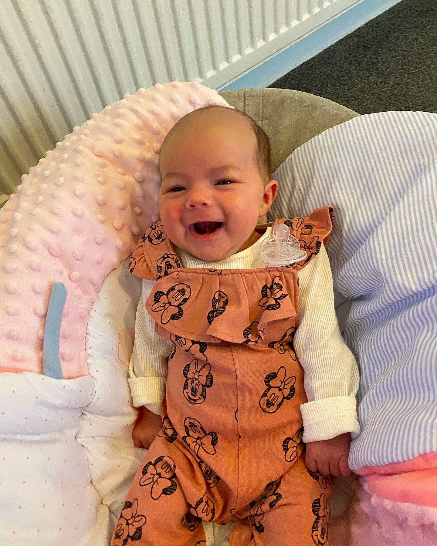 Ayda is registered to the contest to win money with this photo: baby, baby_products, baby_toddler_clothing, cheek, chin, comfort, eye, finger, happy, iris, mouth, nose, person, pink, product, skin, sleeve, smile, stomach, textile