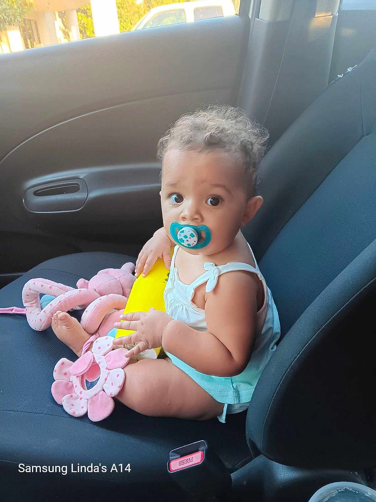 Ayanna joined the competition — help win amazing prizes! baby, car, car_interior, clothing, cream, cushion, dessert, face, food, head, homedecor, icecream, person, photography, portrait, sitting, summer, swimwear, transportation, vehicle