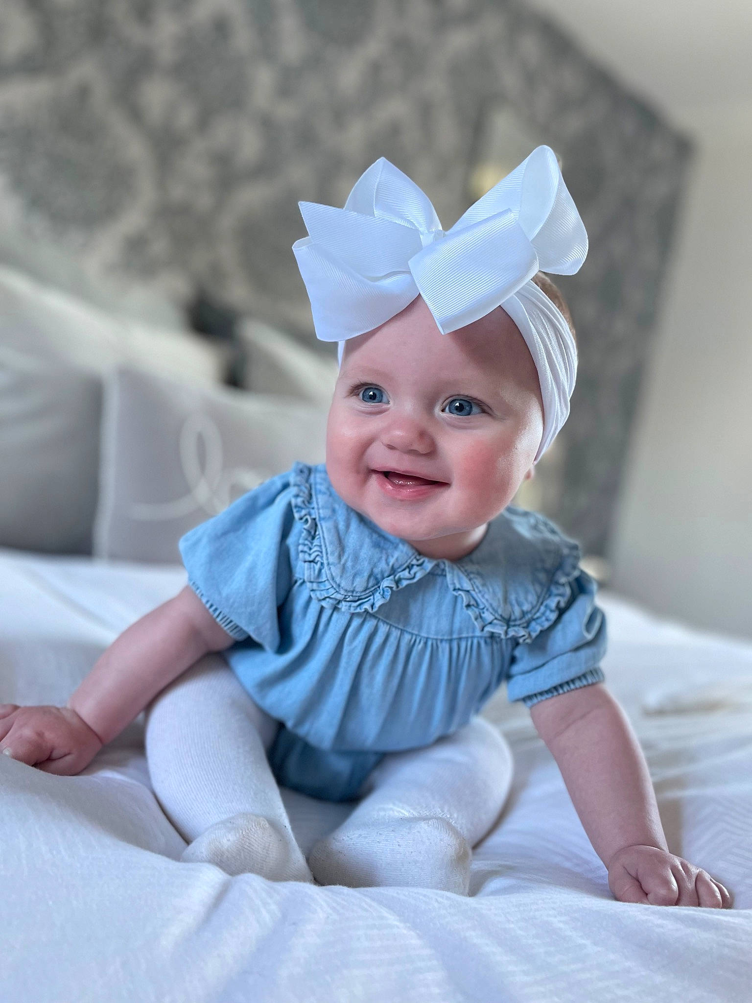 Bella is registered to the contest to win money with this photo: baby, baby_toddler_clothing, comfort, costume_hat, event, fashion_accessory, flash_photography, hair_accessory, happy, hat, headgear, headpiece, headwear, joy, person, pink, product, purple, sleeve, smile