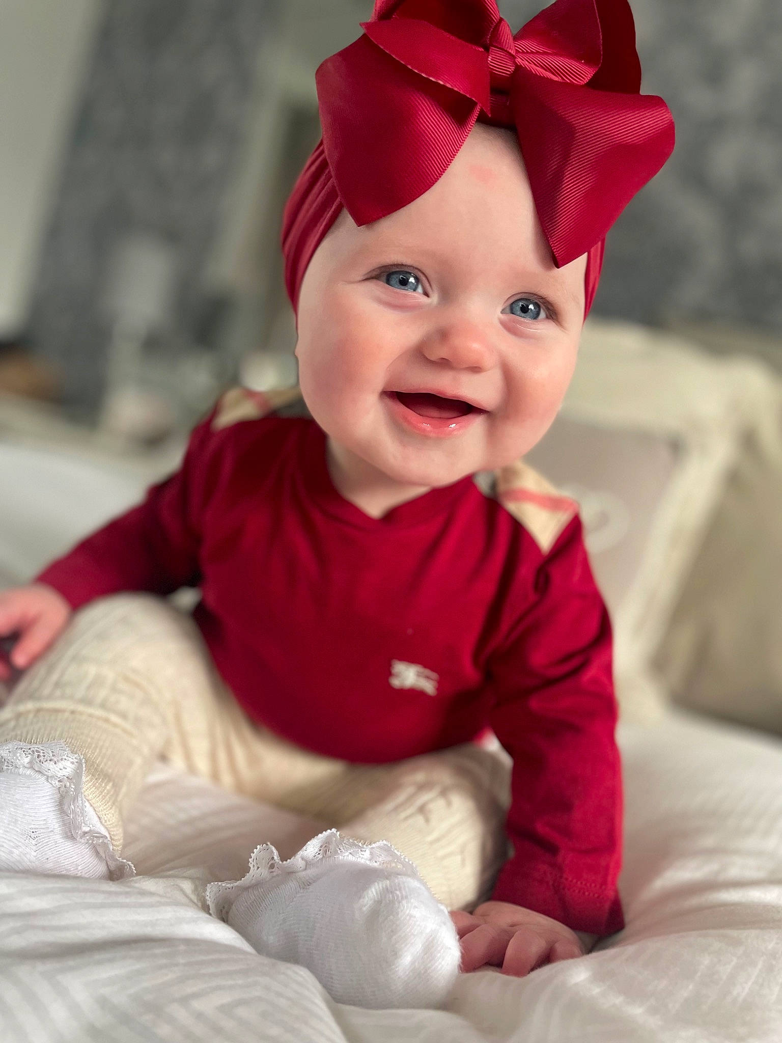 Bella is registered to the contest to win money with this photo: baby, baby_laughing, baby_toddler_clothing, cap, carmine, child, chin, comfort, costume_hat, face, fashion_accessory, happy, hat, head, headwear, joy, lip, magenta, pattern, person