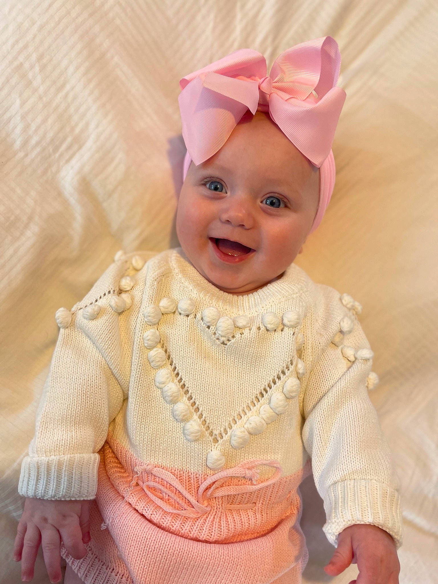 Bella joined the competition — help win amazing prizes! baby, baby_toddler_clothing, cheek, child, chin, dress, embellishment, face, happy, head, headband, headgear, headpiece, headwear, joy, pattern, person, pink, skin, sleeve