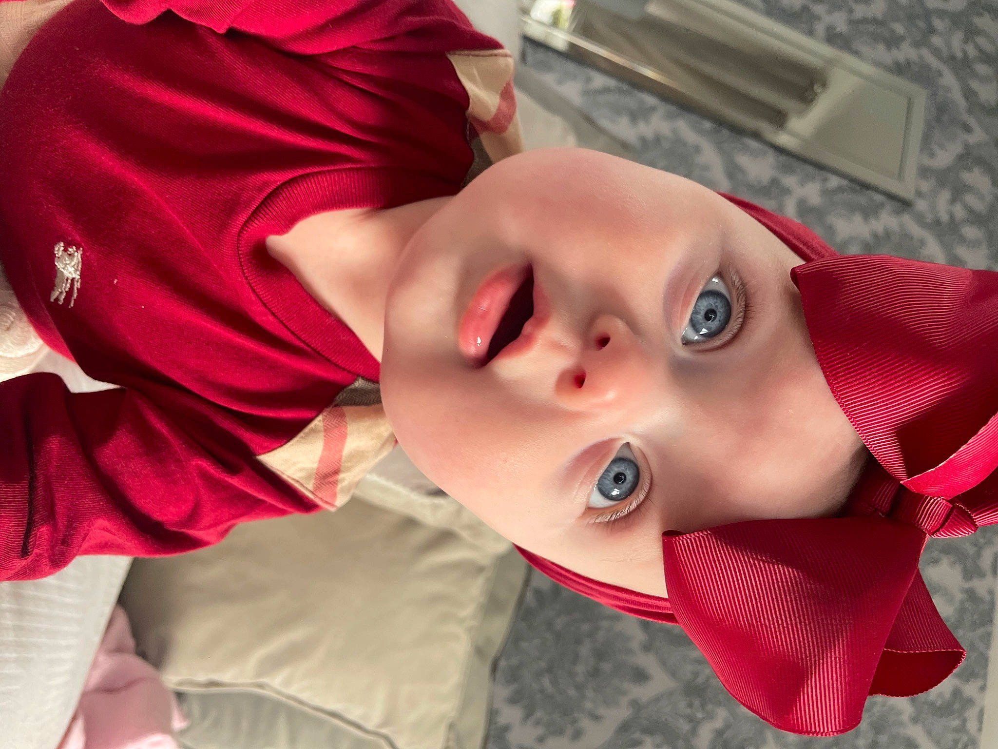 Bella is registered to the contest to win money with this photo: black_hair, chest, child, collar, electric_blue, eye, eyebrow, eyelash, fashion_accessory, happy, headwear, lip, magenta, mouth, neck, nose, pattern, person, selfie, skin