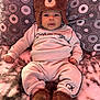 Bryson joined the competition — help win amazing prizes! baby, child, hat, bear_hat, clothing, calvin_klein, sweatshirt, pants, boots, fuzzy, plush, couch, pillow, patterned, indoors, portrait, cute, cozy, warm_lighting, smiling_face