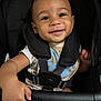 baby, babywear, black, blue, child, clothing, comfort, cute, face, hand, happy, infant, person, portrait, seatbelt, sitting, smile, straps, stroller, young