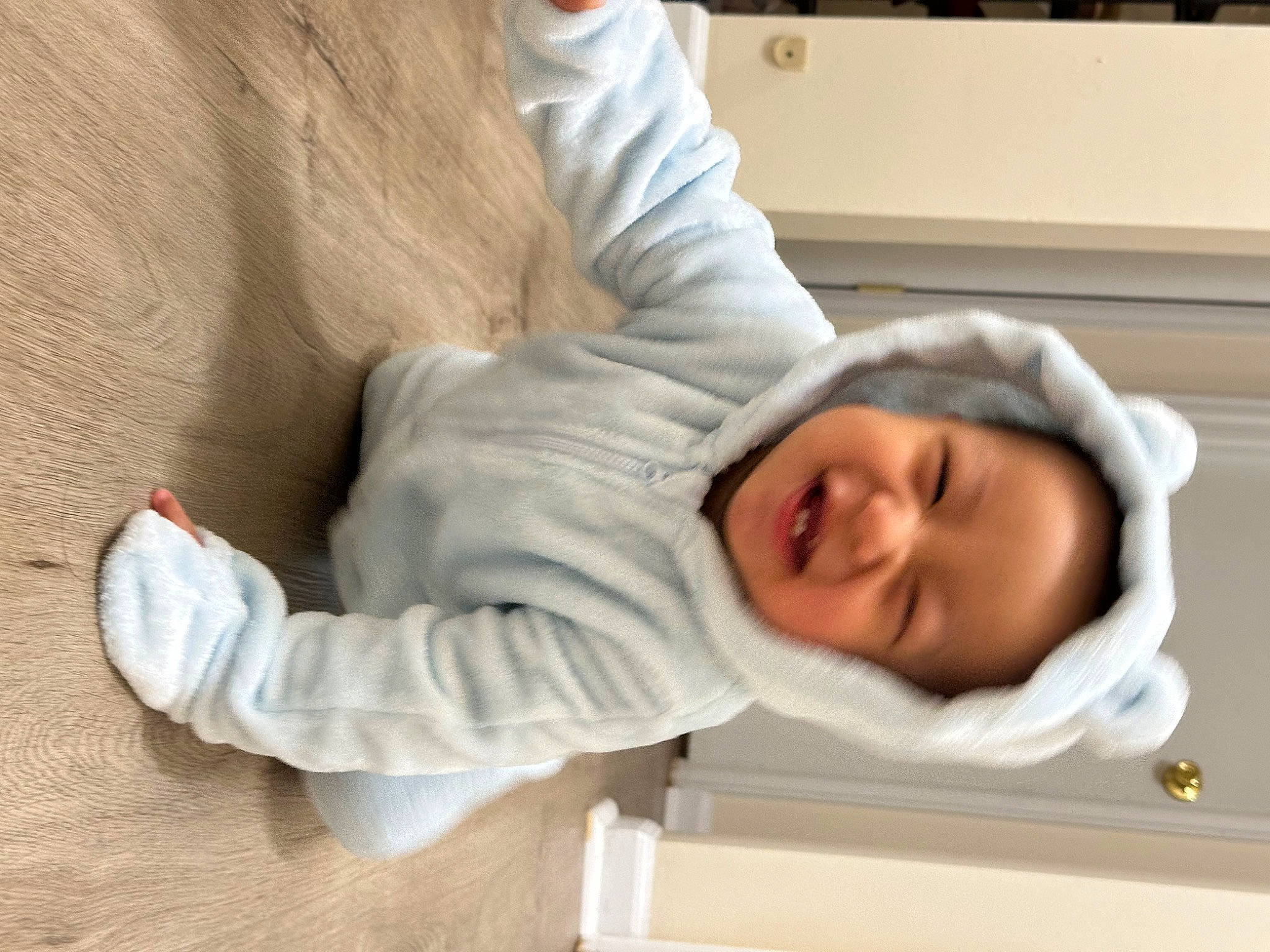 Cyrus is registered to the contest to win money with this photo: baby, baby_products, baby_safety, baby_sleeping, baby_toddler_clothing, child, comfort, flooring, fur, gesture, headwear, linens, mammal, nap, person, room, sitting, sleep, sleeve, smile