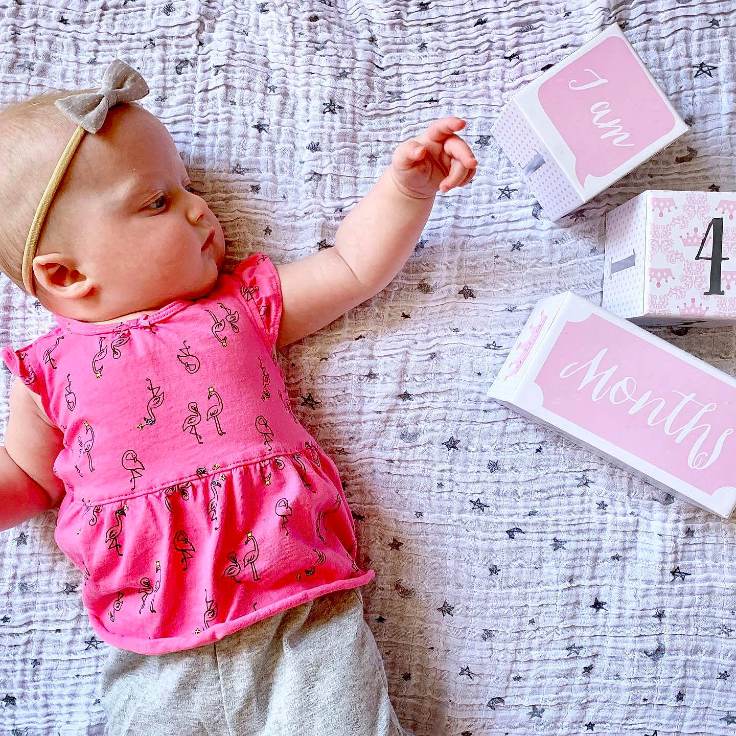 Annabel is registered to the contest to win money with this photo: baby, baby_toddler_clothing, child, design, dress, fashion_accessory, font, outerwear, pattern, person, pink, play, product, t_shirt, textile, toddler