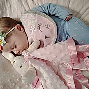 Heaven joined the competition — help win amazing prizes! baby, sleeping, pajamas, headband, flower, plush_toy, blanket, cuddle, cute, infant, soft, comfort, peaceful, pink, blue, face, child, rest, bedtime, cozy