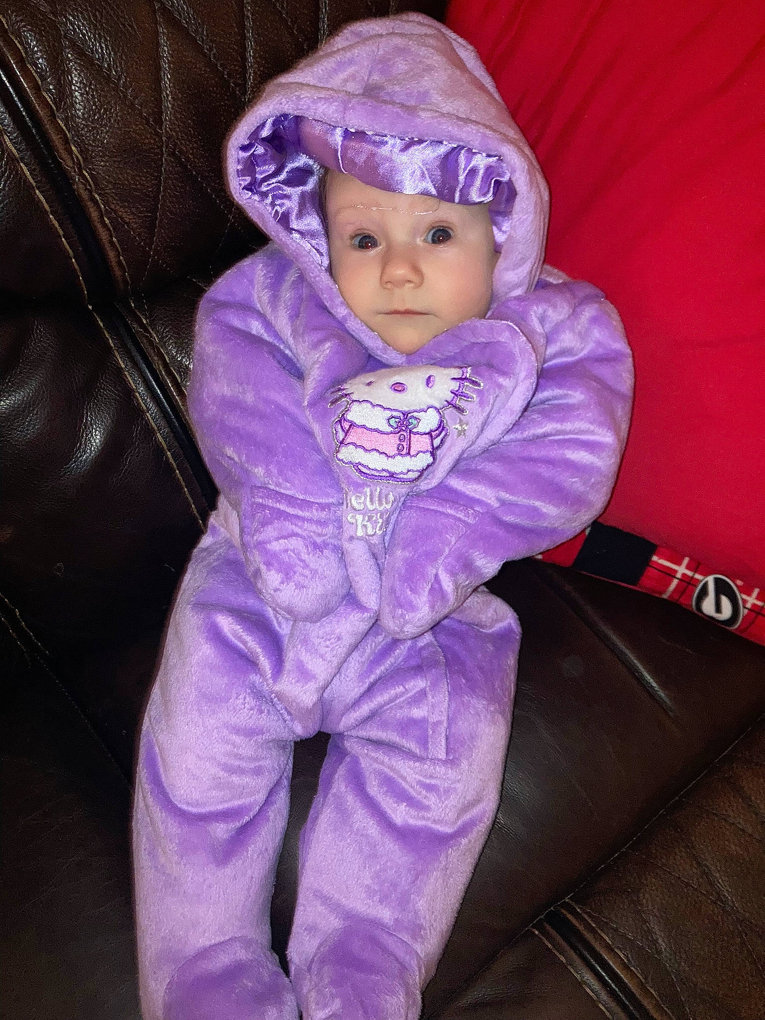 Katalina joined the competition — help win amazing prizes! baby, baby_toddler_clothing, beanie, cap, comfort, electric_blue, fun, headwear, hood, jacket, knit_cap, magenta, outerwear, person, personal_protective_equipment, pink, purple, sitting, sleeve, textile
