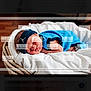Lorenzo is registered to the contest to win money with this photo: architecture, art, baby, bed, bodypart, building, collage, crib, face, finger, furniture, hand, head, hospital, infantbed, newborn, person, photography, portrait, sleeping