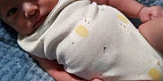 Lorenzo is registered to the contest to win money with this photo: arm, baby, bed, blanket, bodypart, diaper, face, finger, furniture, hand, happy, head, homedecor, newborn, person, photography, portrait, quilt, sleeping, smile