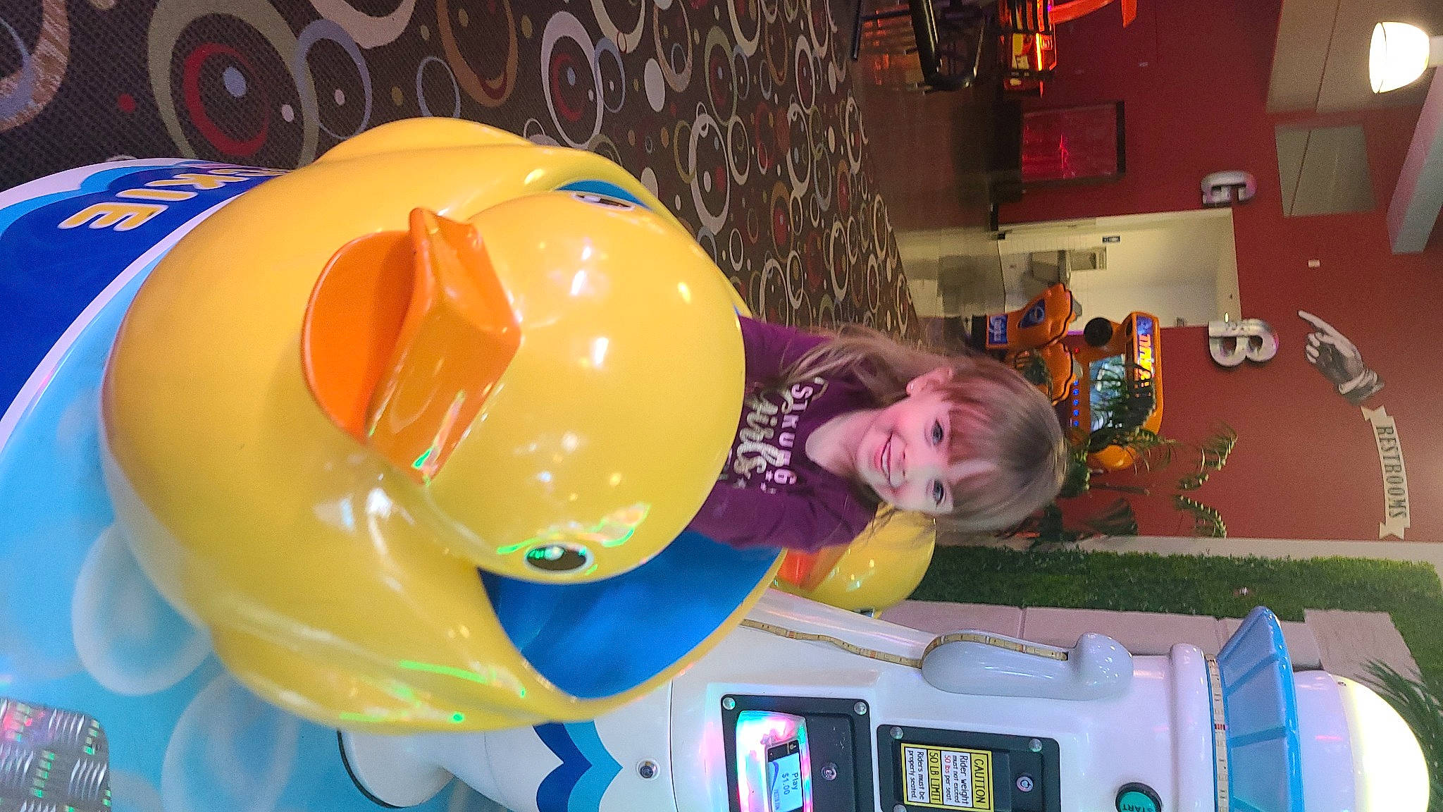 Chevy is registered to the contest to win money with this photo: balloon, child, fun, helmet, joy, leisure, machine, party_supply, person, plastic, play, recreation, room, smile, space, toddler, visual_arts