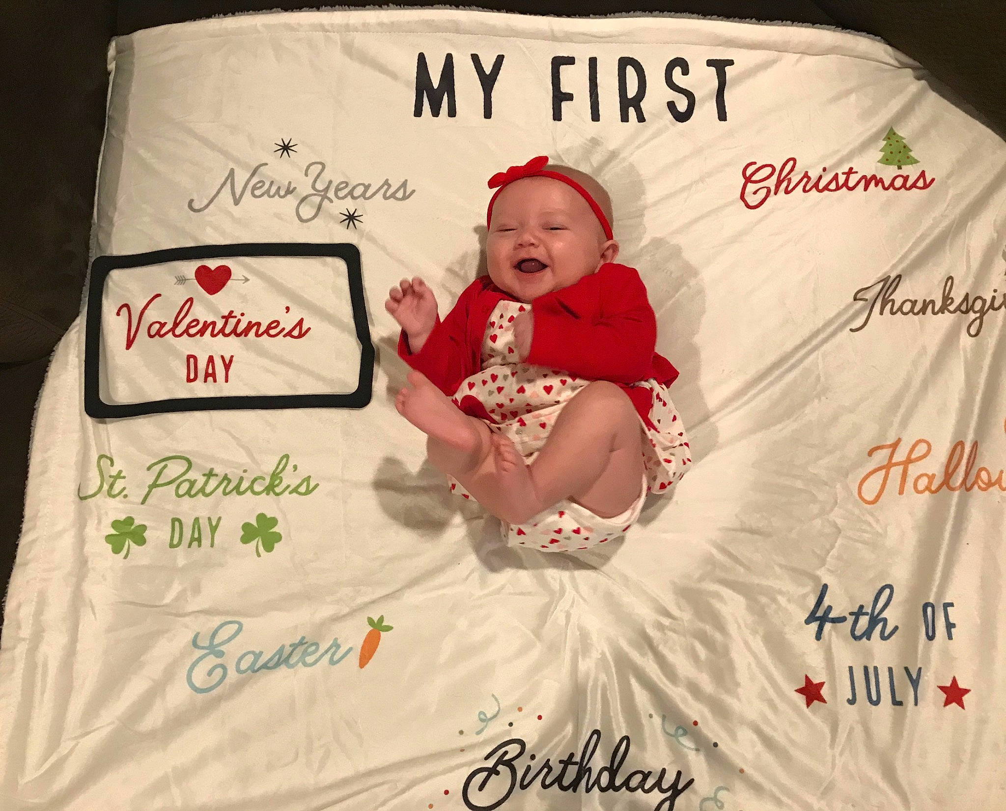 Eliza is registered to the contest to win money with this photo: baby, child, font, person, product, sleeve, t_shirt, textile