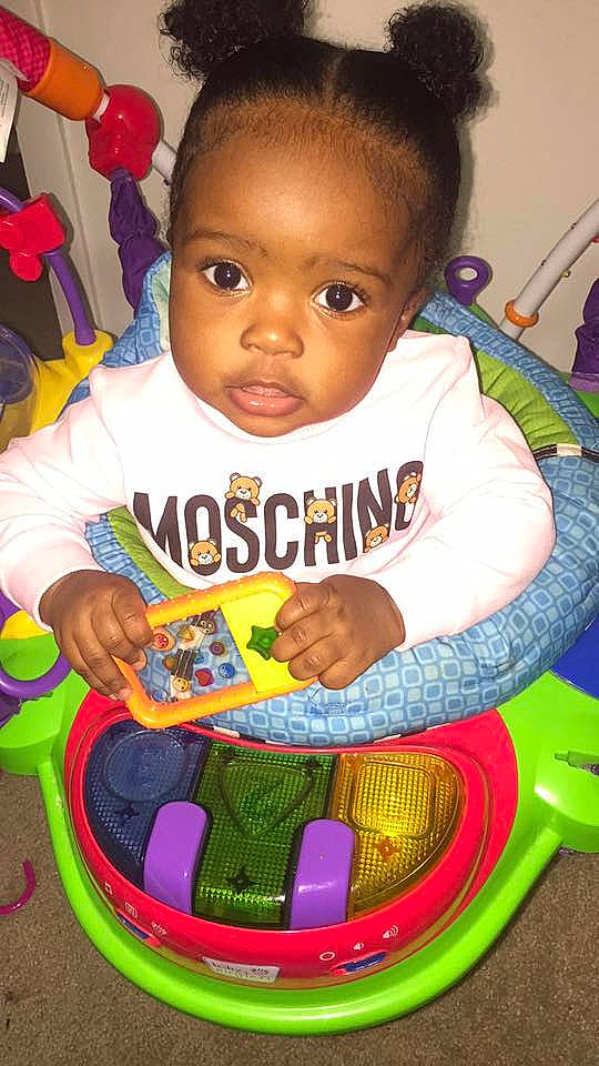 Toni is registered to the contest to win money with this photo: birthday, child, day, fun, infant, person, play, product, smile, toddler, toy