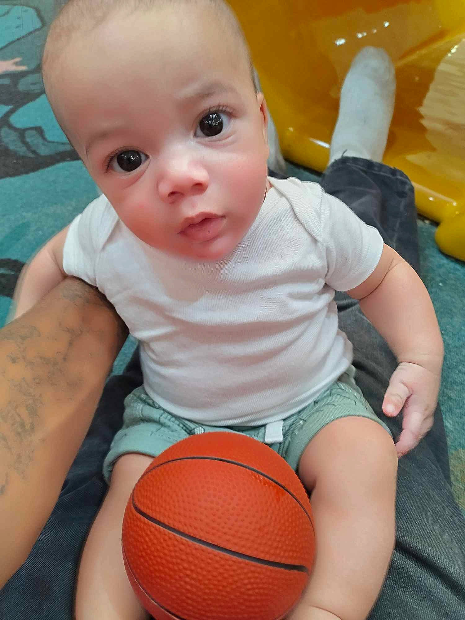 Langston joined the competition — help win amazing prizes! arm, baby_toddler_clothing, ball, basketball, cheek, facial_expression, finger, human_body, iris, joint, leg, mouth, muscle, nose, organ, person, photograph, shorts, skin, sports_equipment