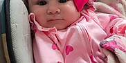Essence joined the competition — help win amazing prizes! baby, child, pink, bow, headband, blanket, heart_pattern, cushion, seated, indoors, infant, clothing, soft, portrait, face, cute, cozy, relaxed, young, person