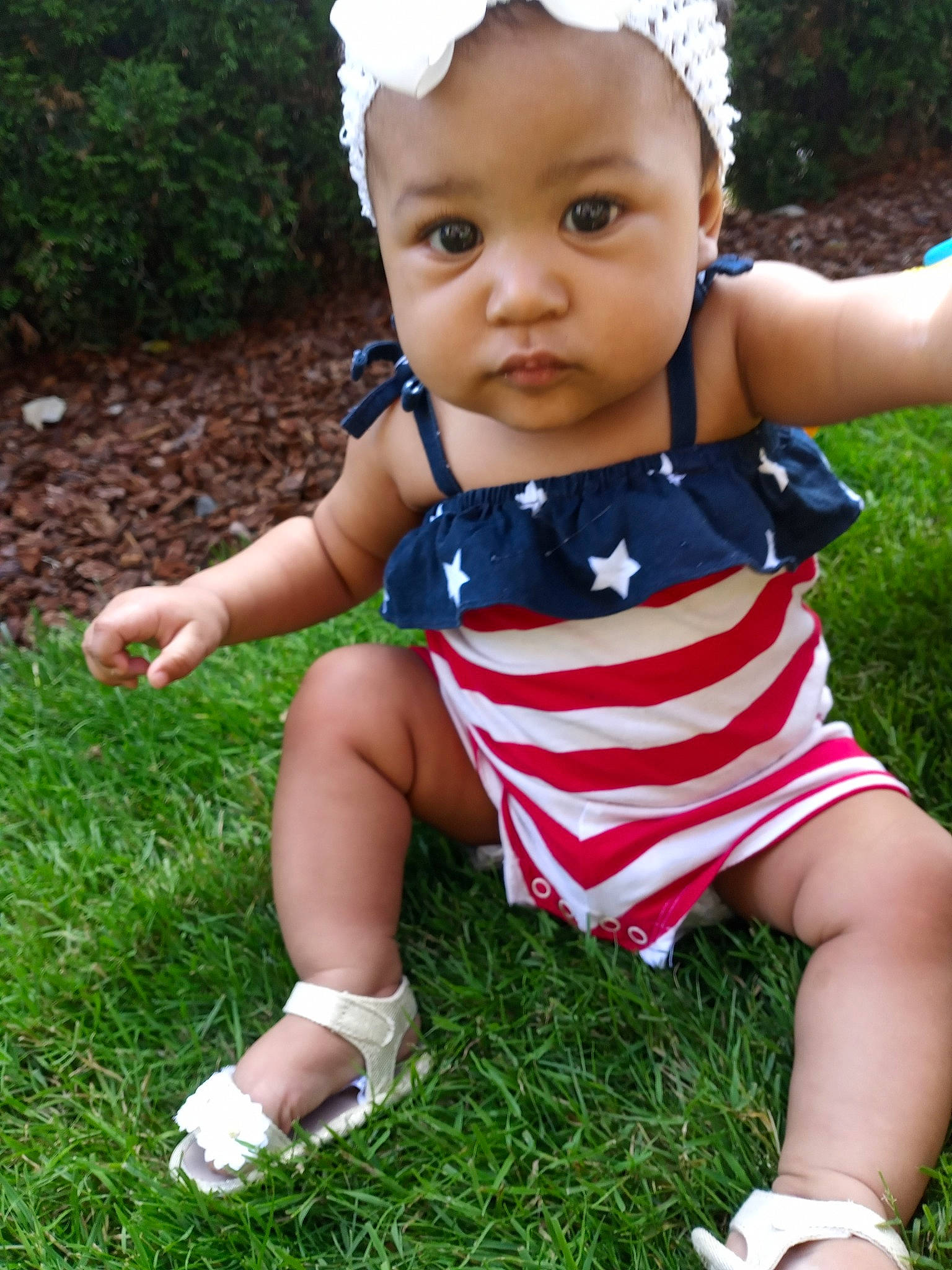 Lanna is registered to the contest to win money with this photo: baby, baby_products, baby_toddler_clothing, child, grass, happy, headgear, person, plant, play, smile, summer, toddler