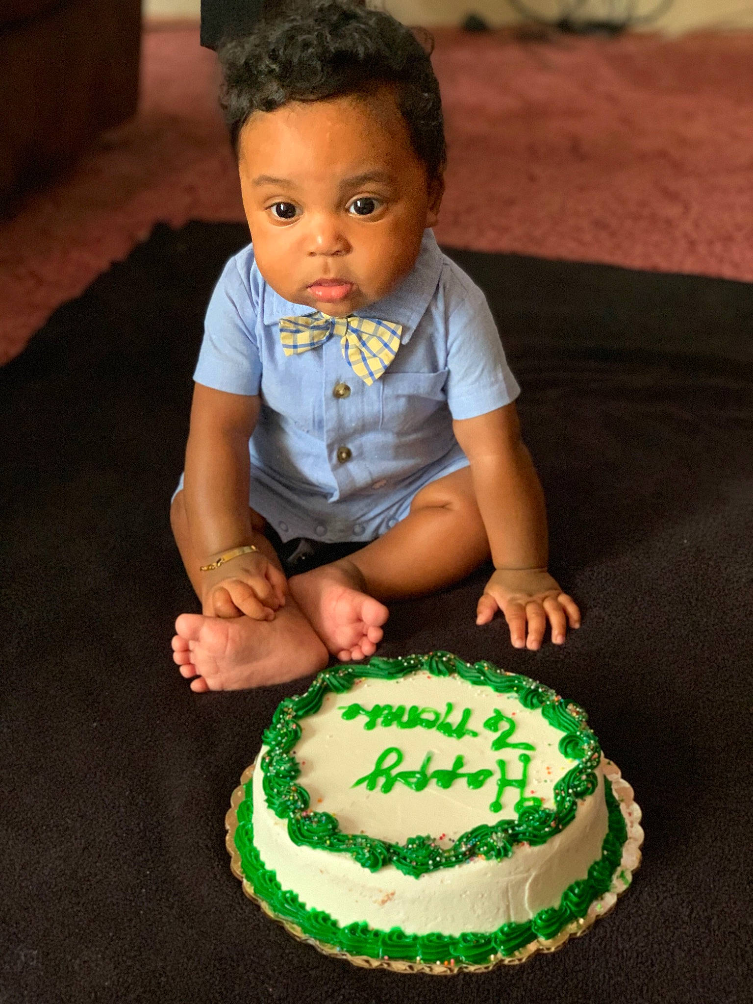 Kalil is registered to the contest to win money with this photo: baby, baked_goods, birthday, birthday_cake, buttercream, cake, cake_decorating, child, dessert, food, fun, green, icing, party, person, royal_icing, smile, sugar_paste, toddler