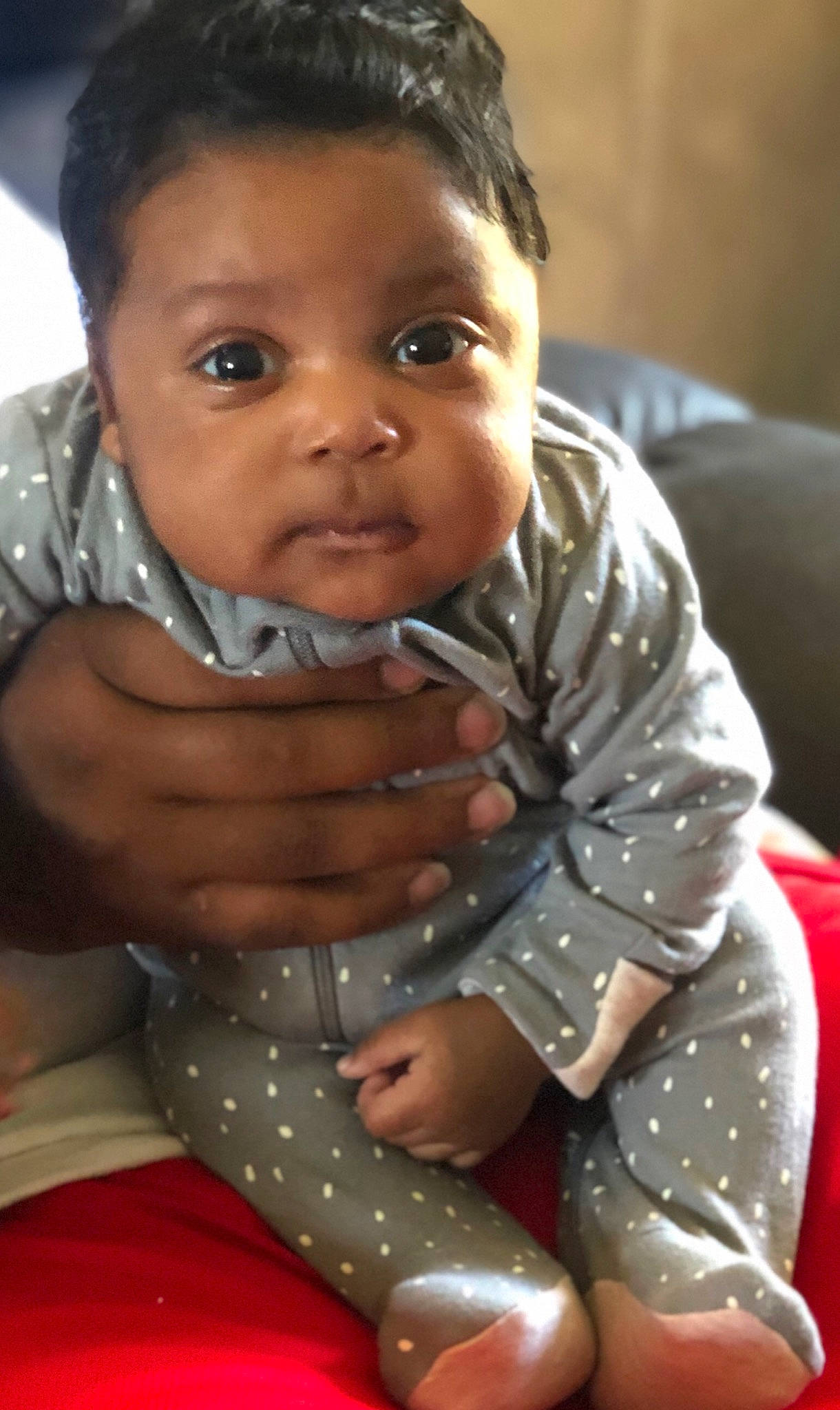 Kalil joined the competition — help win amazing prizes! baby, black_hair, cheek, child, child_model, face, forehead, head, lip, person, sitting, skin, smile, toddler