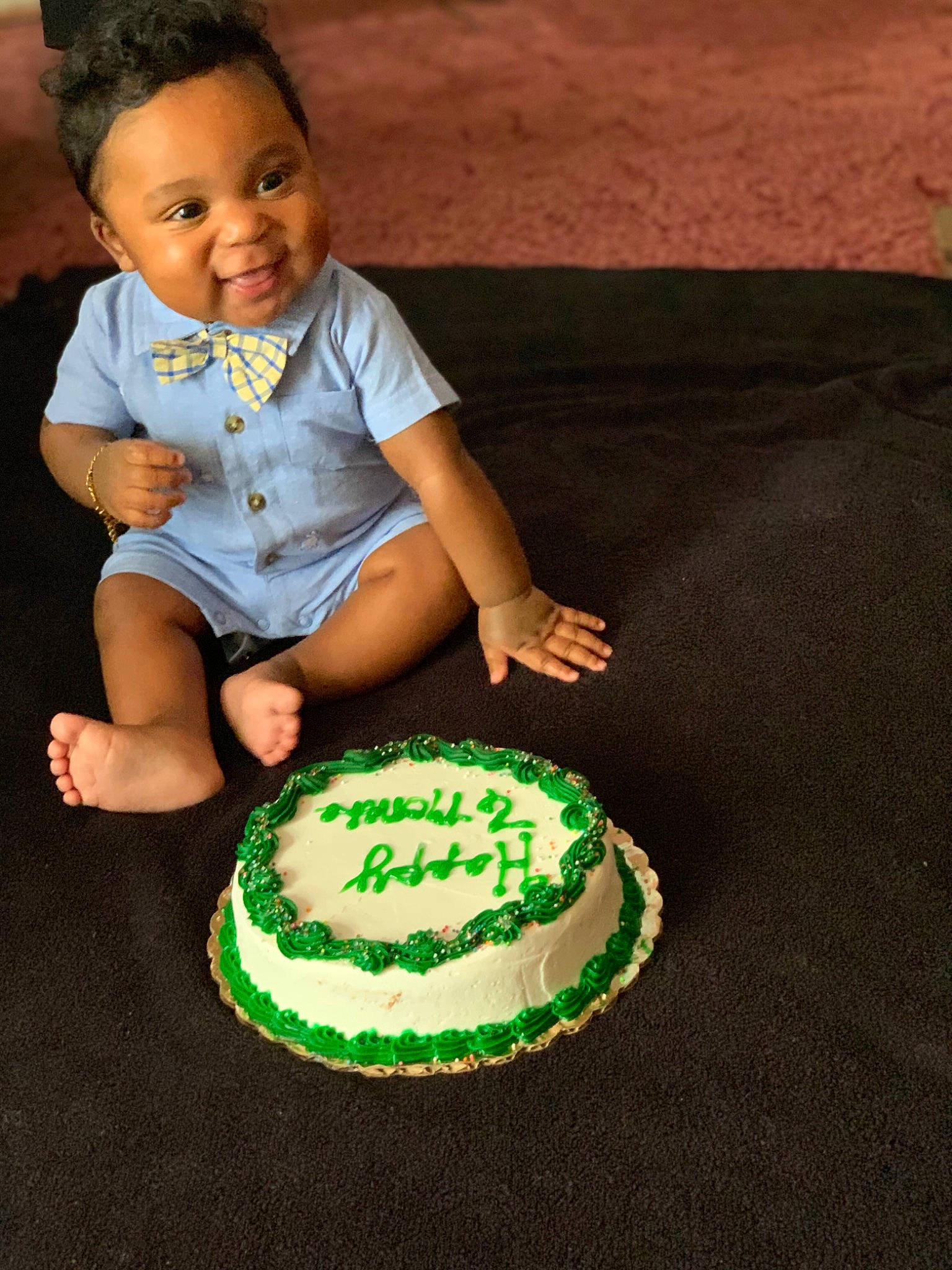 Kalil is registered to the contest to win money with this photo: baby, baked_goods, birthday, birthday_cake, buttercream, cake, cake_decorating, child, dessert, green, icing, person, toddler