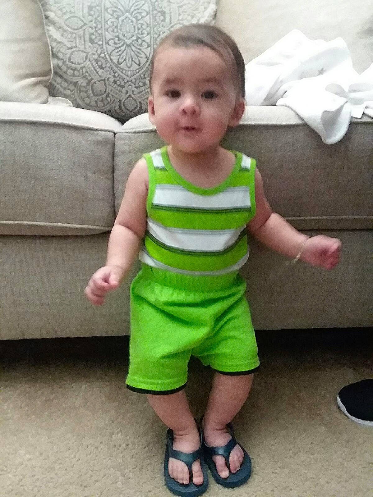 Xavier joined the competition — help win amazing prizes! baby, baby_products, baby_toddler_clothing, child, dress, green, head, leg, person, play, product, shorts, skin, sleeve, smile, standing, t_shirt, toddler