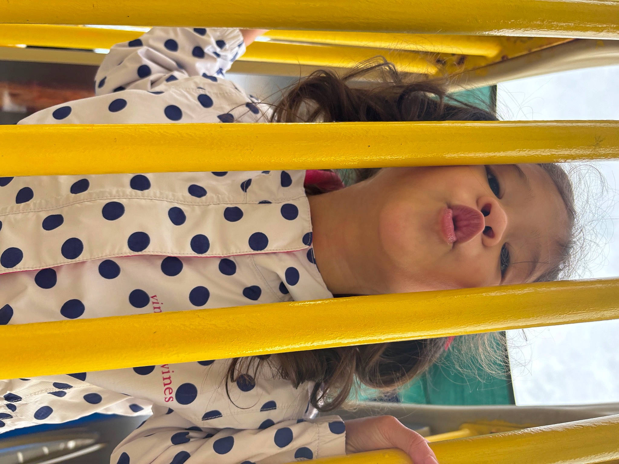 Ariana is registered to the contest to win money with this photo: baby_products, child, circle, eyewear, fun, happy, hat, leisure, linens, pattern, person, plastic, polka_dot, recreation, room, sleeve, sun_hat, thigh, toddler, white