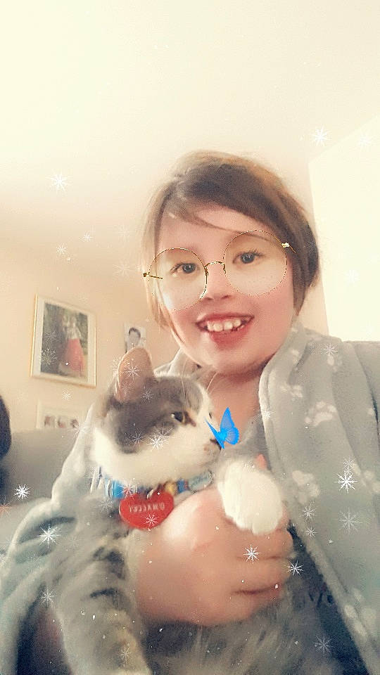 O'Malley participe au concours pour gagner de l'argent avec cette photo : bathing, cat, child, ear, felidae, joy, nose, person, plastic_bottle, skin, small_to_medium_sized_cats, smile, water