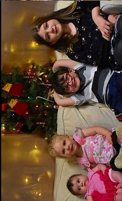 Anna is registered to the contest to win money with this photo: beauty, christmas_decoration, christmas_ornament, christmas_tree, event, facial_expression, flash_photography, fun, happy, head, holiday_ornament, joy, mammal, organ, ornament, people, person, photograph, smile, snapshot