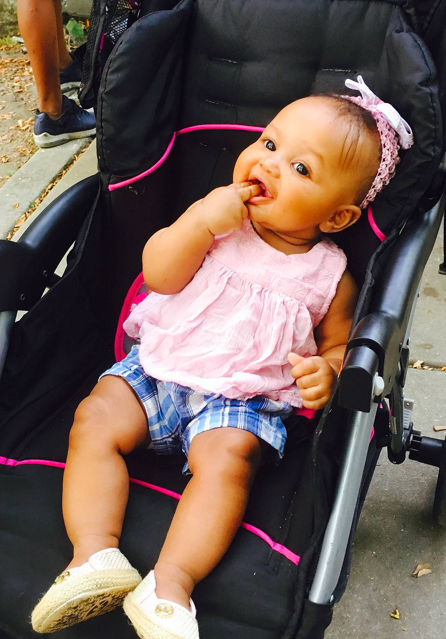 Claudia is registered to the contest to win money with this photo: abdomen, baby_carriage, baby_products, car, car_seat, child, fun, girl, infant, leg, person, pink, product, purple, sitting, skin, smile, toddler