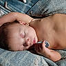 Alaric is registered to the contest to win money with this photo: baby, newborn, sleeping, infant, pacifier, blanket, bedtime, portrait, close_up, peaceful, relaxed, curled_up, lying_down, face, hands, closed_eyes, brown_hair, cozy, indoors, resting